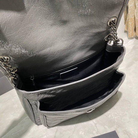 YL NIKI GRIS OBSCURO