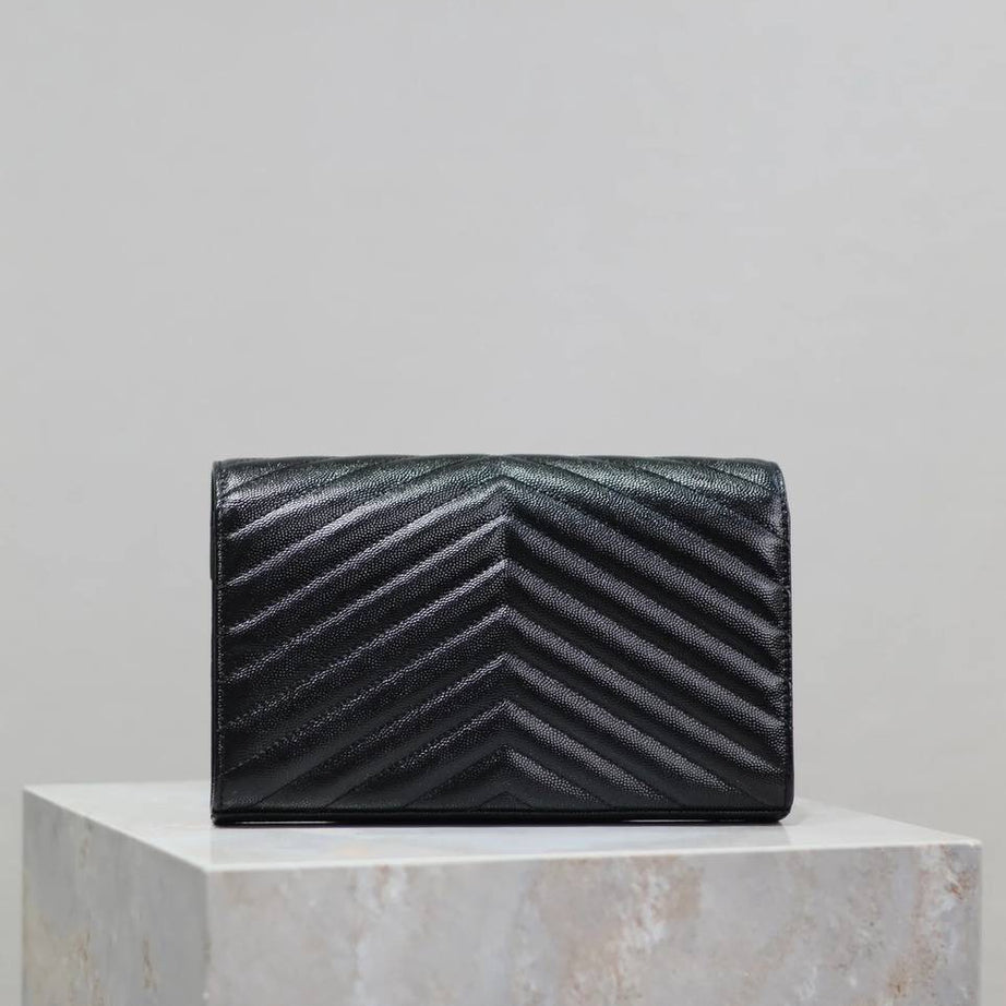 YL WOC NEGRO CON DORADO