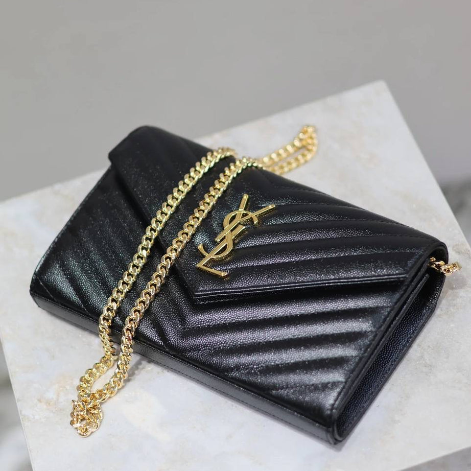 YL WOC NEGRO CON DORADO