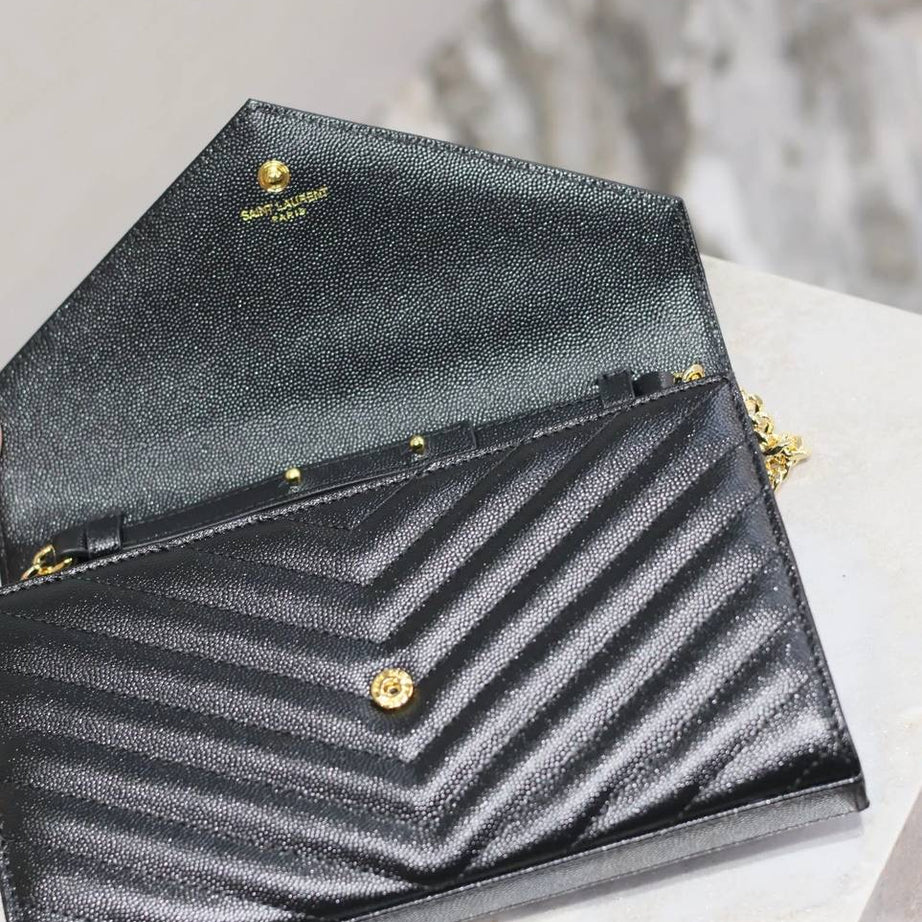 YL WOC NEGRO CON DORADO