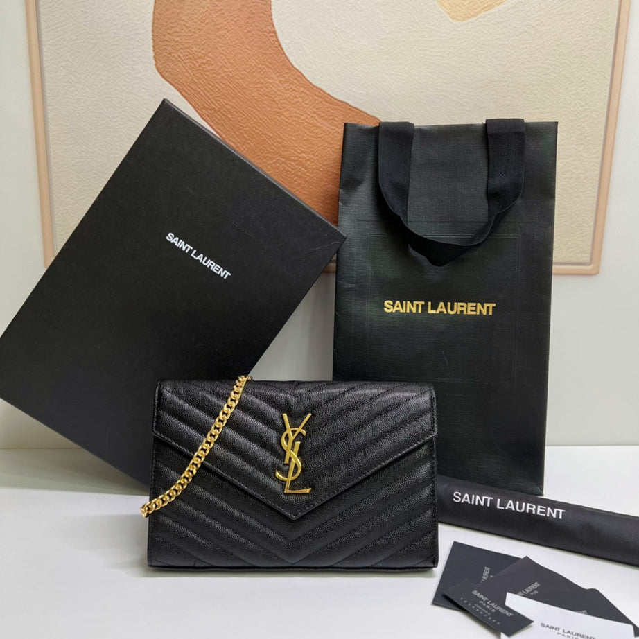 YL WOC NEGRO CON DORADO