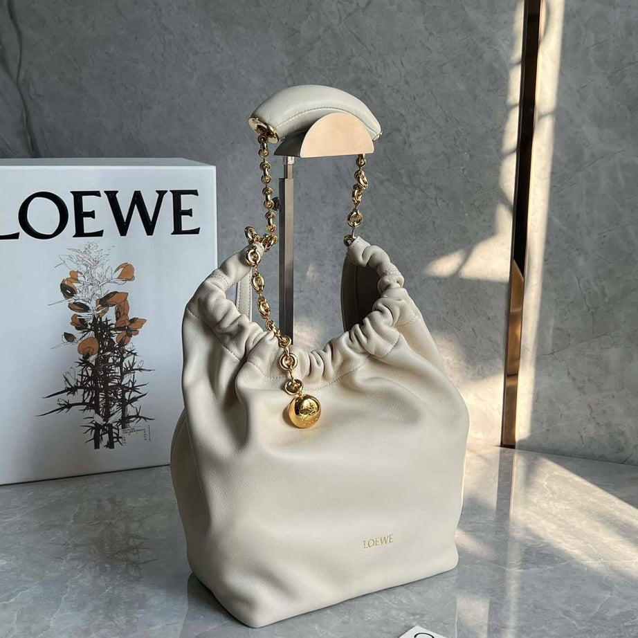 BOLSO SQUEEZE MEDIANO BLANCO
