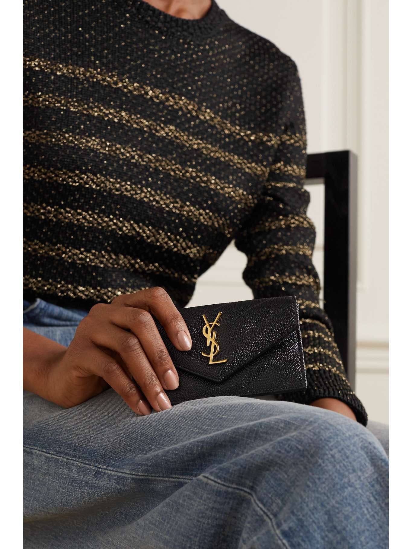 YL CARTERA NEGRA